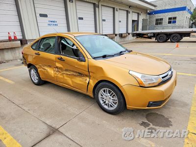 Czwarte zdjęcie samochodu z boku: 2009 FORD FOCUS SE VIN:1FAHP35N29W109242 - miniatura