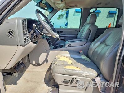 Zdjęcie 7 z 13 samochodu: 2004 GMC YUKON XL K1500 VIN:1GKFK16Z14J154284 - miniatura