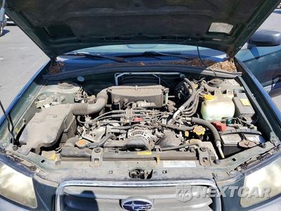 Zdjęcie 12 z 13 samochodu: 2004 SUBARU FORESTER 2.5X VIN:JF1SG63654H707762 - miniatura