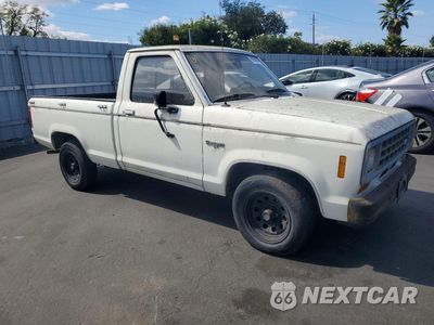 Czwarte zdjęcie samochodu z boku: 1984 FORD RANGER VIN:1FTBR10AXEUD44870 - miniatura