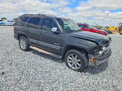 Czwarte zdjęcie samochodu z boku: 2003 CHEVROLET TAHOE C1500 VIN:1GNEC13ZX3R312539 - miniatura