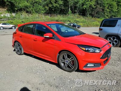 Czwarte zdjęcie samochodu z boku: 2016 FORD FOCUS ST VIN:1FADP3L94GL261669 - miniatura