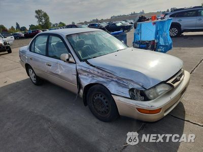 Czwarte zdjęcie samochodu z boku: 1997 TOYOTA COROLLA DX VIN:1NXBB02E1VZ509117 - miniatura