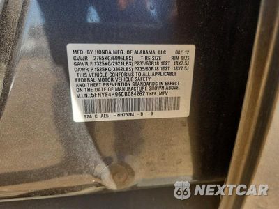 Zdjęcie 13 z 13 samochodu: 2012 HONDA PILOT TOURING VIN:5FNYF4H96CB084262 - miniatura