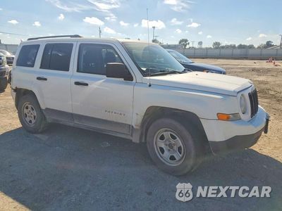 Czwarte zdjęcie samochodu z boku: 2014 JEEP PATRIOT SPORT VIN:1C4NJPBB2ED916351 - miniatura