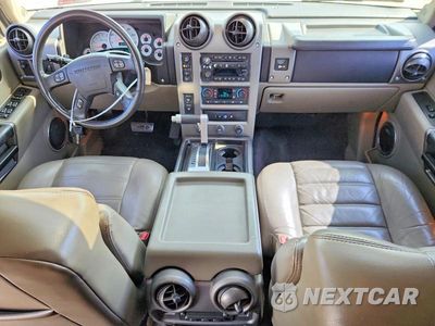 Zdjęcie 8 z 14 samochodu: 2003 HUMMER H2 VIN:5GRGN23U43H145833 - miniatura