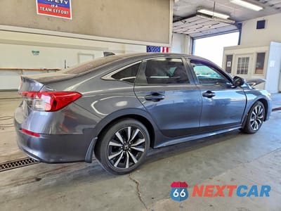 Trzecie zdjęcie samochodu z tyłu: 2022 HONDA CIVIC EX VIN:JHMFE1F74NX005091 - miniatura