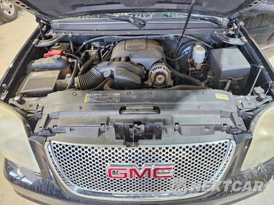 Zdjęcie 12 z 13 samochodu: 2010 GMC YUKON DENALI VIN:1GKUKEEFXAR149619 - miniatura