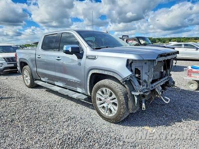 Czwarte zdjęcie samochodu z boku: 2020 GMC SIERRA K1500 DENALI VIN:3GTU9FEDXLG251551 - miniatura