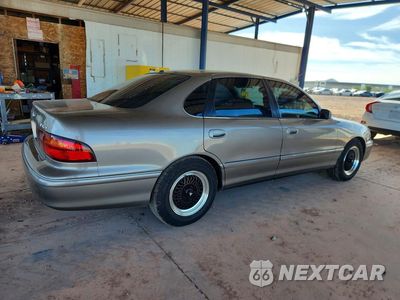Trzecie zdjęcie samochodu z tyłu: 1999 TOYOTA AVALON XL VIN:4T1BF18B0XU324910 - miniatura