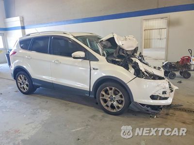 Czwarte zdjęcie samochodu z boku: 2016 FORD ESCAPE TITANIUM VIN:1FMCU0J92GUB20167 - miniatura