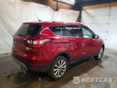 Trzecie zdjęcie samochodu z tyłu: 2017 FORD ESCAPE TITANIUM VIN:1FMCU0JD1HUD90674 - miniatura