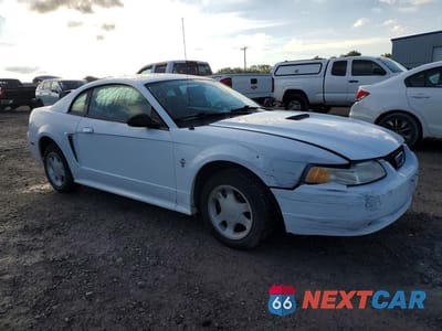 Czwarte zdjęcie samochodu z boku: 2000 FORD MUSTANG VIN:1FAFP4049YF137579 - miniatura