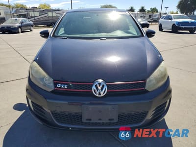 Piąte zdjęcie samochodu w środku: 2012 VOLKSWAGEN GTI VIN:WVWEV7AJ4CW158821 - miniatura
