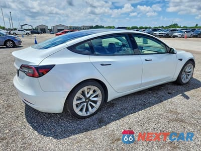Trzecie zdjęcie samochodu z tyłu: 2022 TESLA MODEL 3 VIN:5YJ3E1EA2NF287324 - miniatura