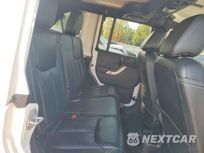 Zdjęcie 10 z 13 samochodu: 2013 JEEP WRANGLER UNLIMITED SAHARA VIN:1C4BJWEG3DL575695 - miniatura
