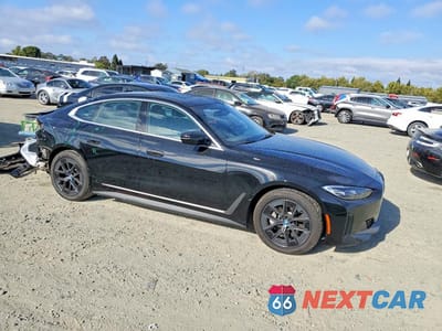 Czwarte zdjęcie samochodu z boku: 2023 BMW I4 EDRIVE 35 VIN:WBY43AW08PFP83192 - miniatura