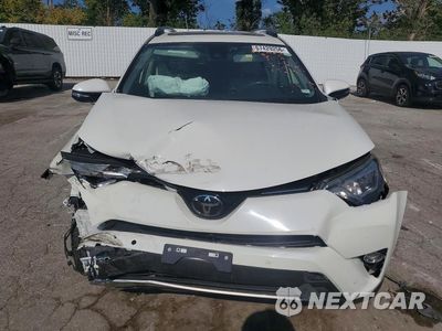 Piąte zdjęcie samochodu w środku: 2018 TOYOTA RAV4 LIMITED VIN:JTMDFREV8JJ723762 - miniatura