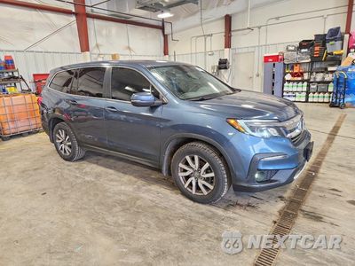 Czwarte zdjęcie samochodu z boku: 2022 HONDA PILOT EXL VIN:5FNYF6H56NB020346 - miniatura