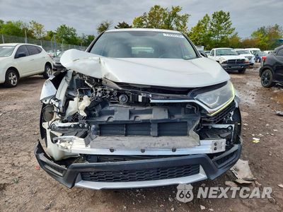 Piąte zdjęcie samochodu w środku: 2019 HONDA CR-V LX VIN:2HKRW6H31KH202553 - miniatura