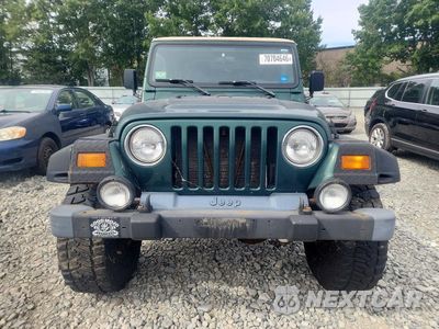 Piąte zdjęcie samochodu w środku: 1999 JEEP WRANGLER / TJ SAHARA VIN:1J4FY49SXXP482292 - miniatura