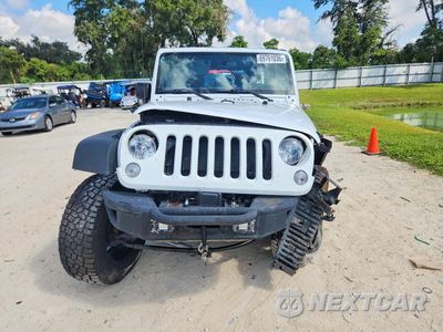 Piąte zdjęcie samochodu w środku: 2016 JEEP WRANGLER UNLIMITED SPORT VIN:1C4BJWDG4GL265321 - miniatura
