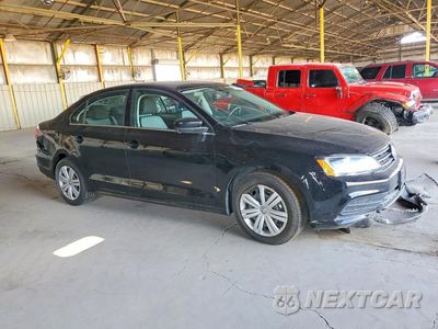 Czwarte zdjęcie samochodu z boku: 2017 VOLKSWAGEN JETTA S VIN:3VW2B7AJ5HM412407 - miniatura