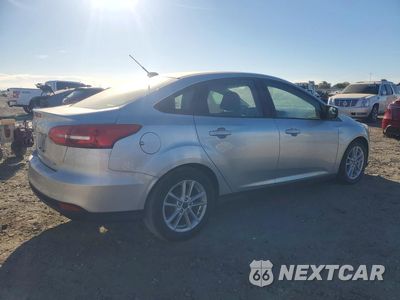 Trzecie zdjęcie samochodu z tyłu: 2017 FORD FOCUS SE VIN:1FADP3F27HL296433 - miniatura