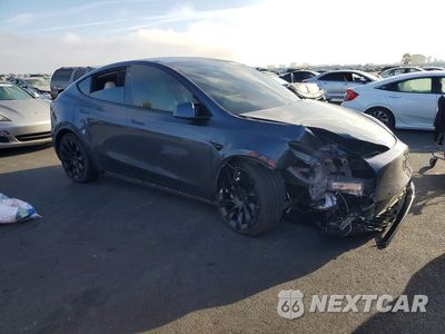 Czwarte zdjęcie samochodu z boku: 2021 TESLA MODEL Y VIN:5YJYGDEE3MF078239 - miniatura