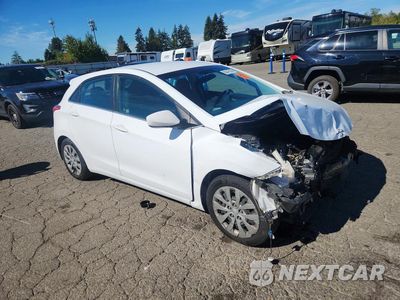Czwarte zdjęcie samochodu z boku: 2016 HYUNDAI ELANTRA GT BASE VIN:KMHD35LH1GU341557 - miniatura