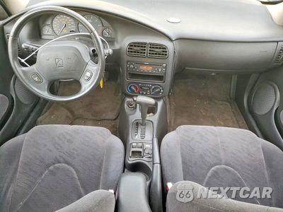 Zdjęcie 8 z 13 samochodu: 2001 SATURN SC2 VIN:1G8ZY12741Z105177 - miniatura