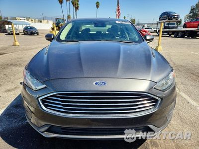 Piąte zdjęcie samochodu w środku: 2020 FORD FUSION SE VIN:3FA6P0LU7LR236952 - miniatura