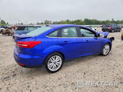 Trzecie zdjęcie samochodu z tyłu: 2015 FORD FOCUS TITANIUM VIN:1FADP3J27FL313316 - miniatura