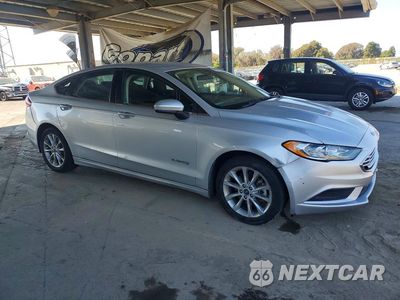 Czwarte zdjęcie samochodu z boku: 2017 FORD FUSION SE HYBRID VIN:3FA6P0LU4HR374794 - miniatura