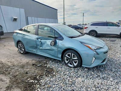 Czwarte zdjęcie samochodu z boku: 2018 TOYOTA PRIUS THREE TOURING VIN:JTDKARFU3J3060228 - miniatura