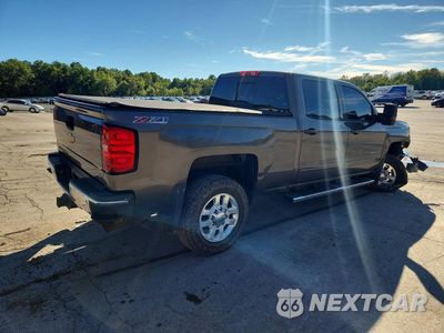 Trzecie zdjęcie samochodu z tyłu: 2015 CHEVROLET SILVERADO K2500 HEAVY DUTY LT VIN:1GC1KVEG0FF624338 - miniatura