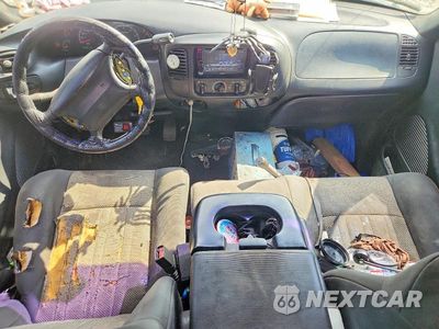 Zdjęcie 8 z 12 samochodu: 2003 FORD F-150 SPRCAB STYSD VIN:1FTRX17L93NA98364 - miniatura
