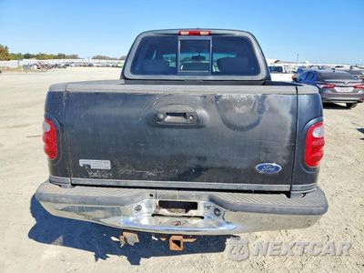 Zdjęcie 6 z 12 samochodu: 2003 FORD F150 SUPERCREW VIN:1FTRW08L83KB62813 - miniatura