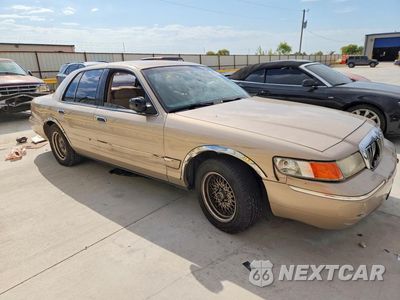 Czwarte zdjęcie samochodu z boku: 1998 MERCURY GRAND MARQUIS GS VIN:2MEFM74W9WX662447 - miniatura