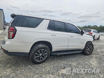 Trzecie zdjęcie samochodu z tyłu: 2021 CHEVROLET TAHOE C1500 LT VIN:1GNSCNKD1MR385400 - miniatura