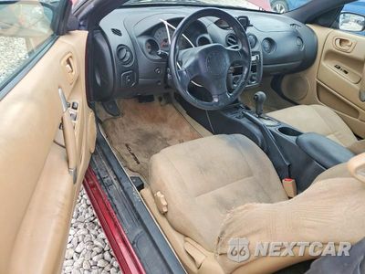 Zdjęcie 8 z 12 samochodu: 2001 MITSUBISHI ECLIPSE SPYDER GS VIN:4A3AE45G71E047319 - miniatura