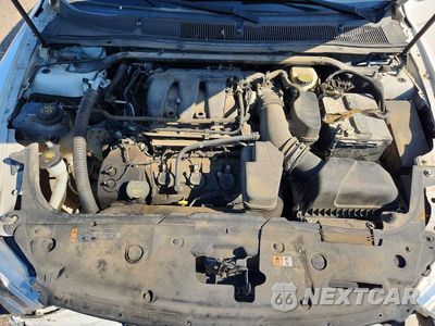 Zdjęcie 11 z 13 samochodu: 2018 FORD TAURUS SEL VIN:1FAHP2E86JG115662 - miniatura
