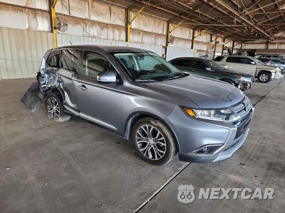 Czwarte zdjęcie samochodu z boku: 2016 MITSUBISHI OUTLANDER SE VIN:JA4AD3A3XGZ050052 - miniatura