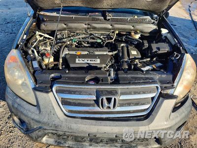 Zdjęcie 12 z 14 samochodu: 2006 HONDA CR-V LX VIN:JHLRD785X6C036664 - miniatura