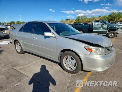 Czwarte zdjęcie samochodu z boku: 2003 TOYOTA CAMRY LE V6 VIN:4T1BF30K73U544711 - miniatura