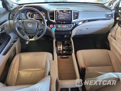 Zdjęcie 8 z 14 samochodu: 2018 HONDA PILOT TOURING VIN:5FNYF6H95JB034798 - miniatura