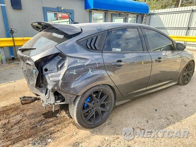 Trzecie zdjęcie samochodu z tyłu: 2018 FORD FOCUS VIN:1FADP3L92JL229780 - miniatura