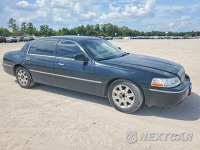 Czwarte zdjęcie samochodu z boku: 2011 LINCOLN TOWN CAR EXECUTIVE L VIN:2LNBL8EV5BX766146 - miniatura
