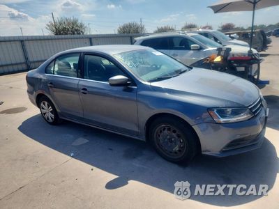 Czwarte zdjęcie samochodu z boku: 2017 VOLKSWAGEN JETTA S VIN:3VW2B7AJ1HM212494 - miniatura