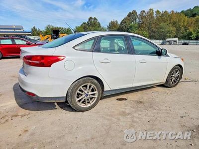 Trzecie zdjęcie samochodu z tyłu: 2018 FORD FOCUS SE VIN:1FADP3F23JL225123 - miniatura